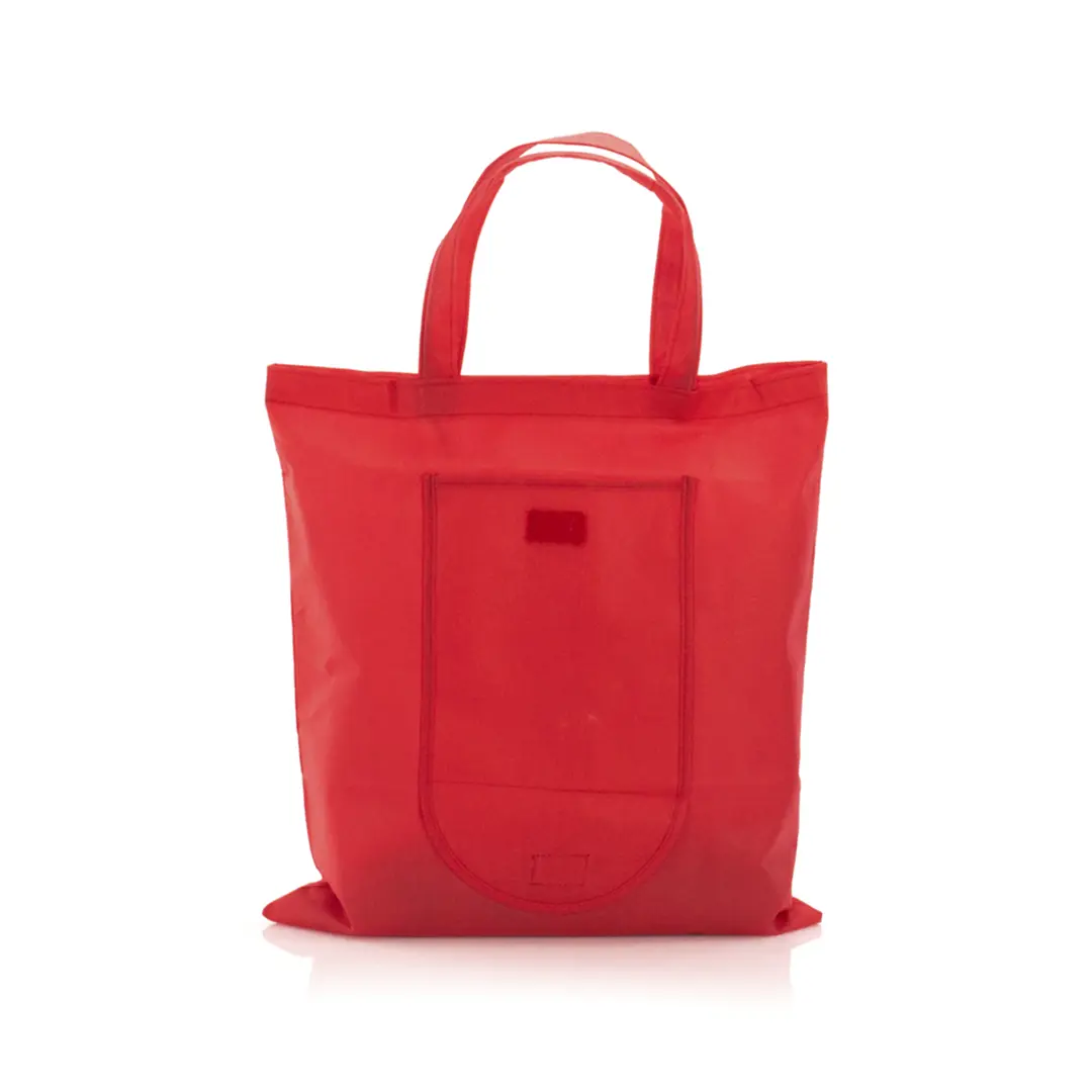 bolsa tote roja de tela con bolsillo delantero y asas sobre fondo blanco
