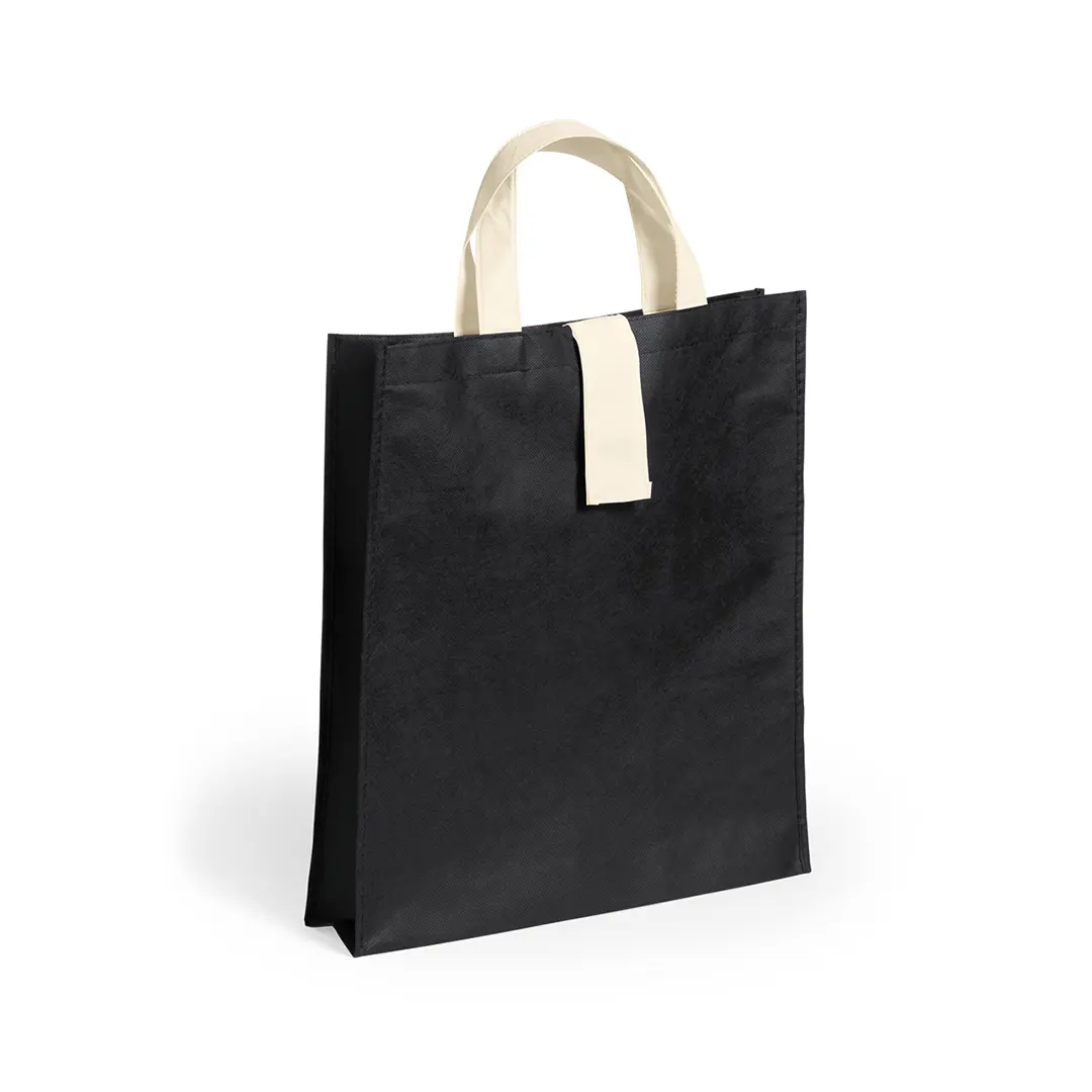 Bolsa reutilizable negra con asas crema y cierre de velcro sobre fondo blanco