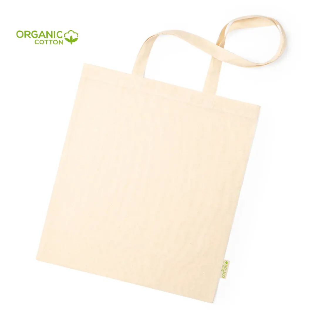 bolsa tote de algodón orgánico crudo con asas largas sobre fondo blanco
